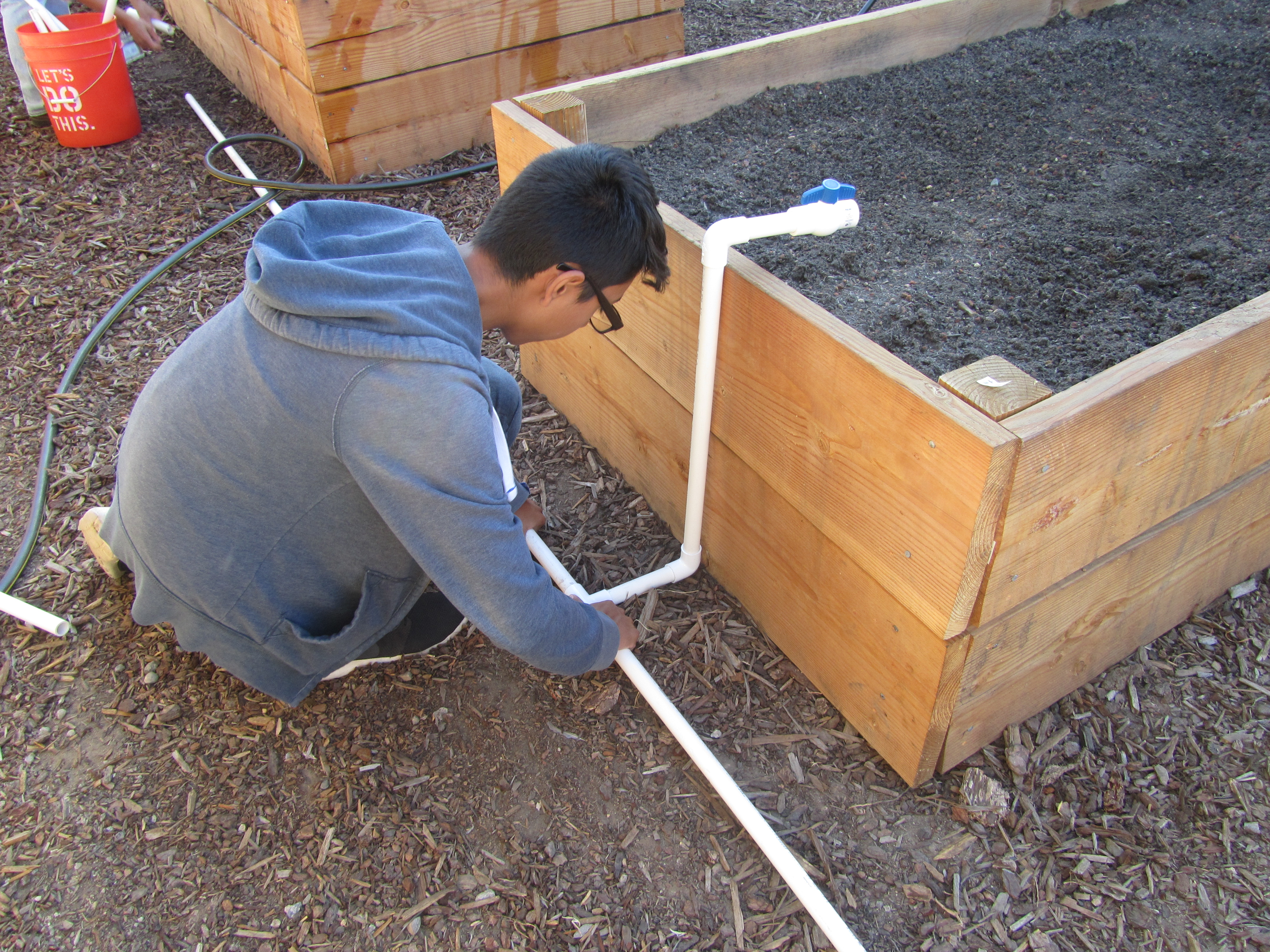 Installing the PVC at Bryte for garden beds